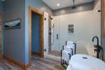 Primary Bathroom with Walk-In Shower and Soaking Tub